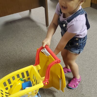 One of our savvy shoppers. She is choosing her own items!