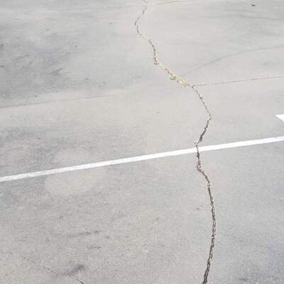 Basketball Court Foundation cracking thoroughout.