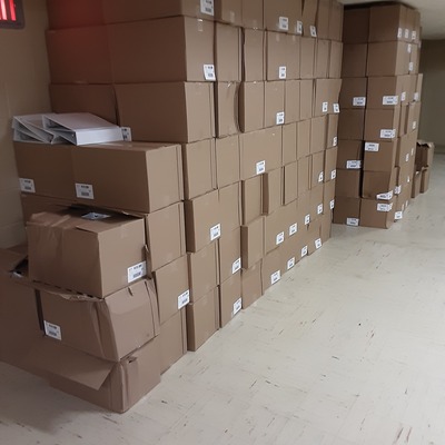 Boxes of binders waiting for distribution