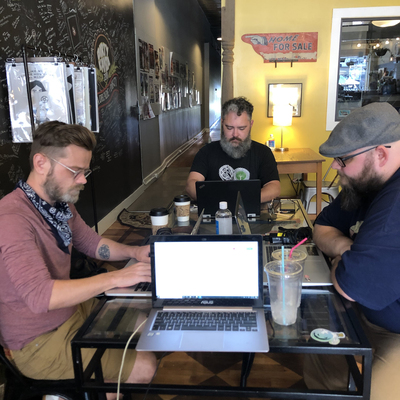 No Coast team members planning the 2021 festival in Gravel City Roasters