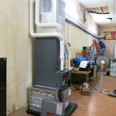 Match Day Funds at work, new AC/Heater in the room holding artifacts and archives