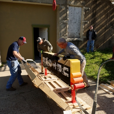 The day finally arrived to hang the new neon sign funded with a Project WeKan crowdfunding project.