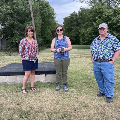 Historic preservationists from the Kansas State Historical Society reviewing eligibility