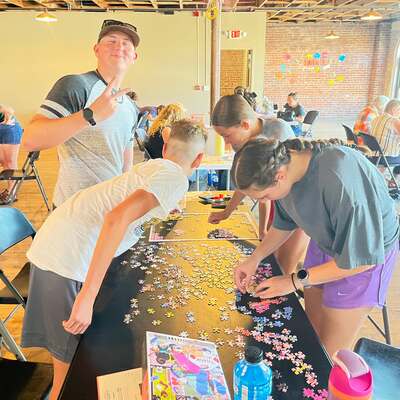 Piece, love, and joy at the Jigsaw Jam. Partnership with Emporia Main Street and Trox Gallery.