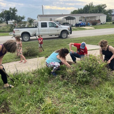 White City Willing Workers 4-H club helped cleanup weeds/trees in front of the church May 26, 2023