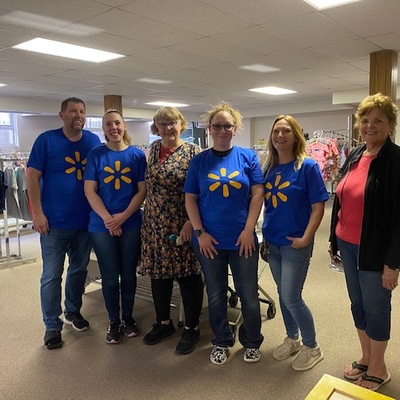 The local Walmart store presented a grant and sent a team to assist in the Baby Closet