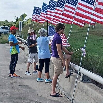 Flag Day participants over I-35