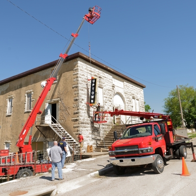 Big, tall machines to help raise it up!