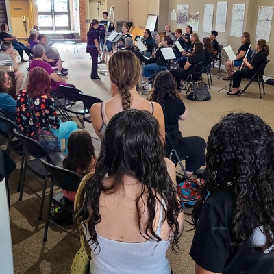 Emporia Community Flute Choir performs on the first floor.